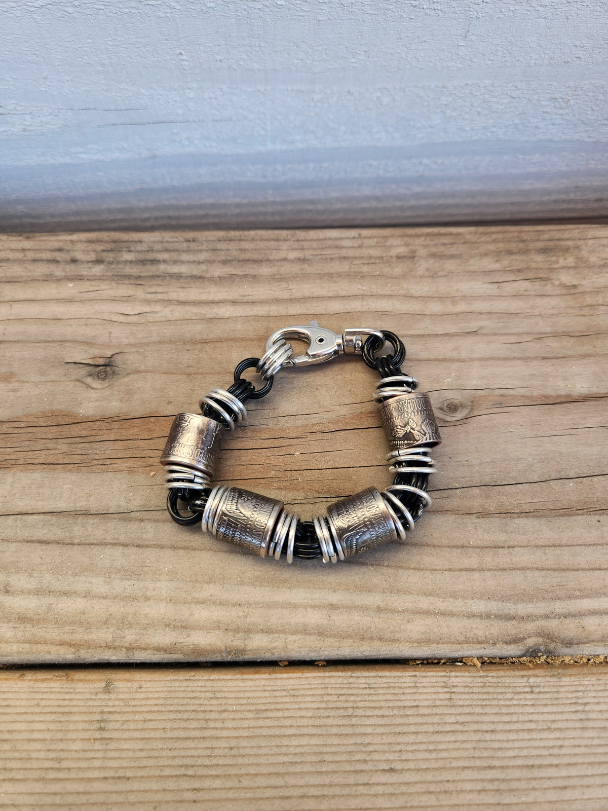 Custom United States Half Dollar Coin and Black Ring Bracelet with Unique Design and Secure Closure