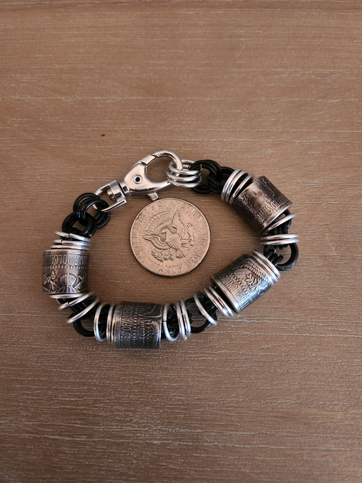 Custom United States Half Dollar Coin and Black Ring Bracelet with Unique Design and Secure Closure