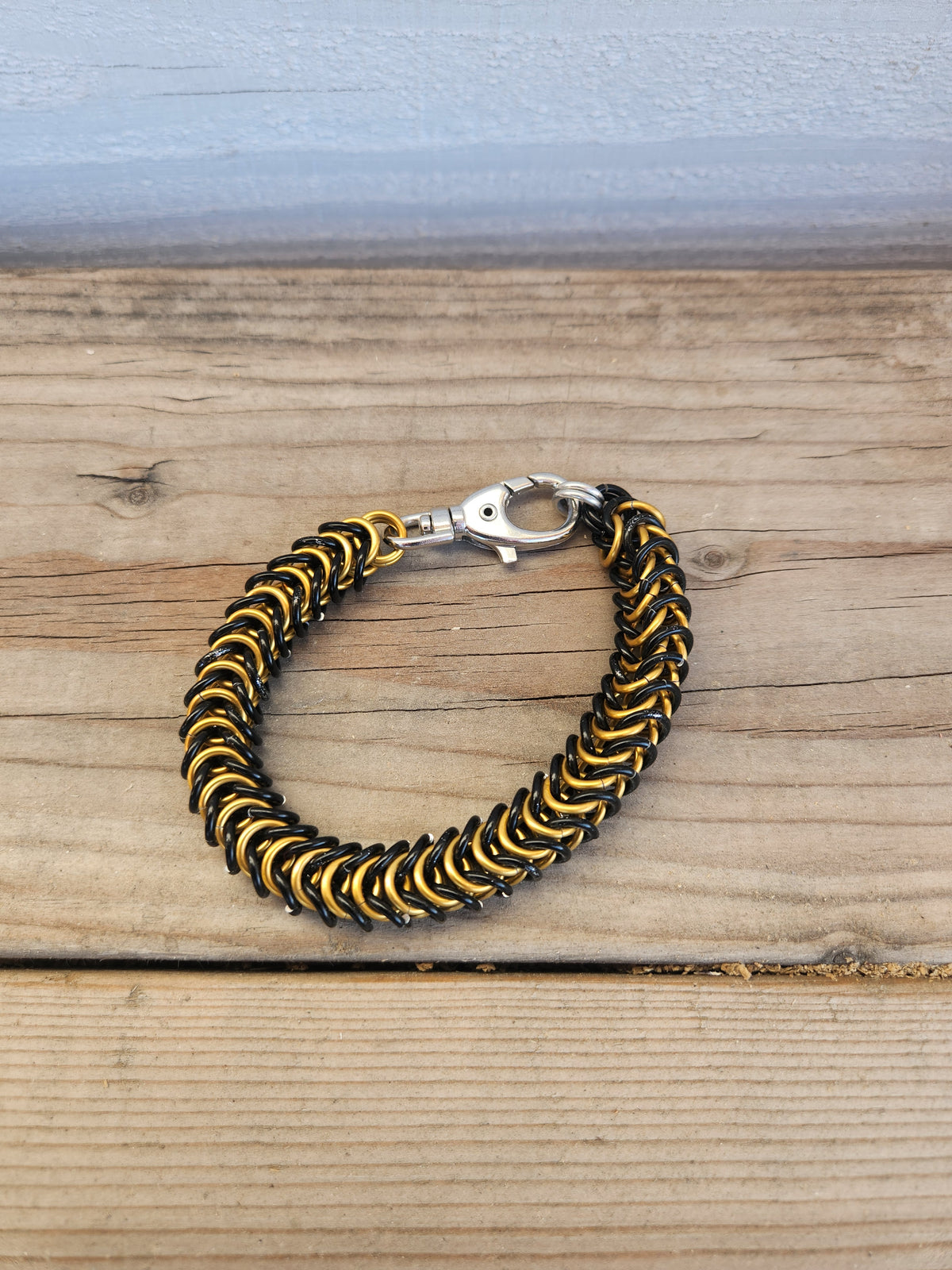 Polished and Black Weaved Box Chain Bracelet
