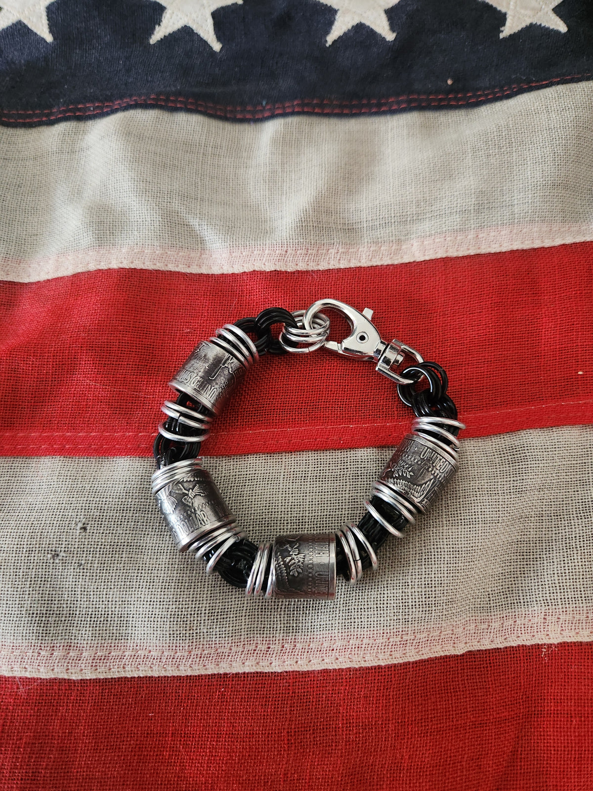 Custom United States Half Dollar Coin and Black Ring Bracelet with Unique Design and Secure Closure