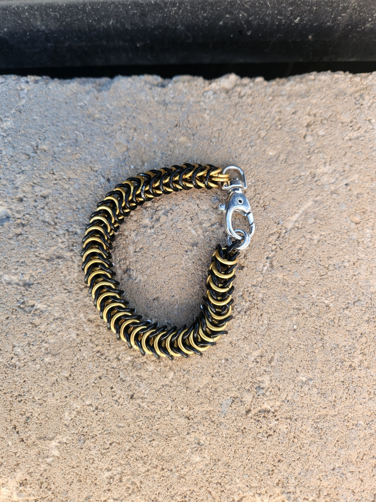 Polished and Black Weaved Box Chain Bracelet
