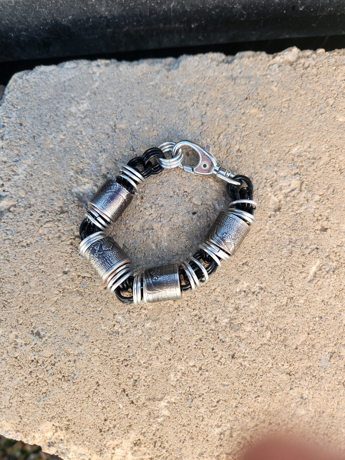 Custom United States Half Dollar Coin and Black Ring Bracelet with Unique Design and Secure Closure